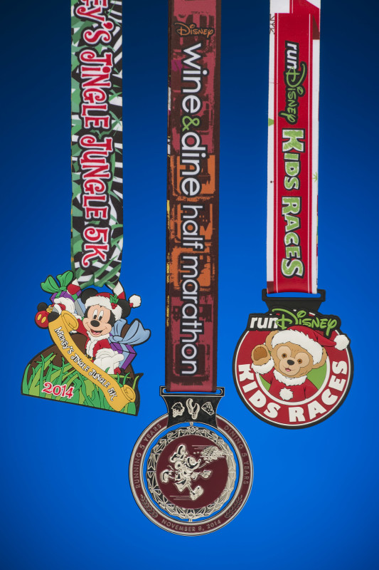 5th anniversary collection of the Disney Wine and Dine Half Marathon Weekend finisher medals