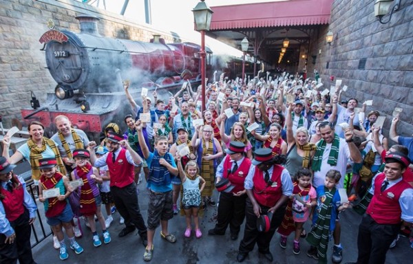 Cheers from guests filled the air at Hogsmeade Station today as Universal Orlando Resort celebrated its one millionth rider on the Hogwarts Express ? the iconic train that transported Harry Potter and his friends between Hogsmeade Station and King?s Cross Station in J.K. Rowling?s beloved series. To celebrate this magical milestone, nearly two hundred guests were given complimentary Butterbeer ice-cream. In early July, guests began boarding the Hogwarts Express to travel between The Wizarding World of Harry Potter ? Hogsmeade in Universal?s Islands of Adventure and The Wizarding World of Harry Potter ? Diagon Alley in Universal Studios Florida. The incredible journey, which requires a park-to-park ticket, combines powerful storytelling, live special effects, lifelike animation and state-of-the-art technology to take riders on the journey of a lifetime. © 2014 Universal Orlando Resort. All rights reserved. HARRY POTTER, characters, names and related indicia are trademarks of and © Warner Bros. Entertainment Inc. Harry Potter Publishing Rights © JKR.  (s14)