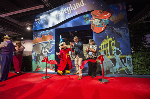 D23 EXPO 2015 - D23 EXPO, the ultimate Disney fan event, brings together all the past, present and future of Disney entertainment under one roof. Taking place August 14-16, this year marks the fourth D23 EXPO at the Anaheim Convention Center and promises to be the biggest and most spectacular yet. (ABC/Image Group LA) MICKEY MOUSE, ADAM SANDERSON (Senior Vice President, Corporate Communications, The Walt Disney Company), BECKY KLEIN