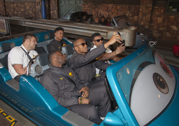 (December 26, 2015) Ð Defensive Back Jordan Lomax (front row left), Wide Receiver Tevaun Smith (front row middle) and Running Back Jordan Canzeri (front row right) from the No. 5 CFP-ranked Iowa Hawkeyes, champions of the Big Ten West Division, ride Radiator Springs Racers at Disney California Adventure Park in Anaheim, Calif., on Saturday during the teamÕs first official Rose Bowl Game week appearance. (Scott Brinegar/Disneyland Resort)